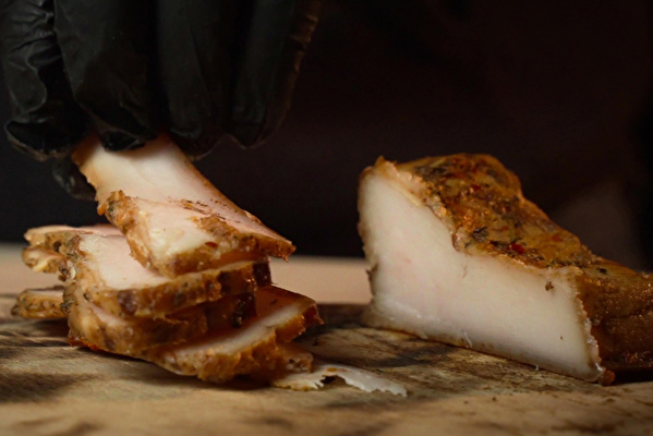 Smoked pork fatback with herbs
