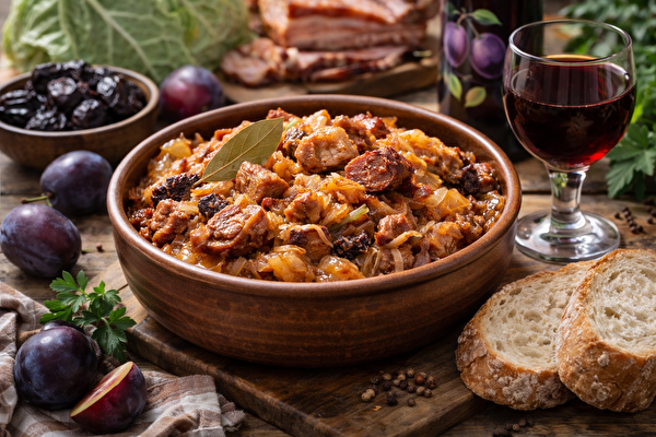 Homemade bigos with plum wine